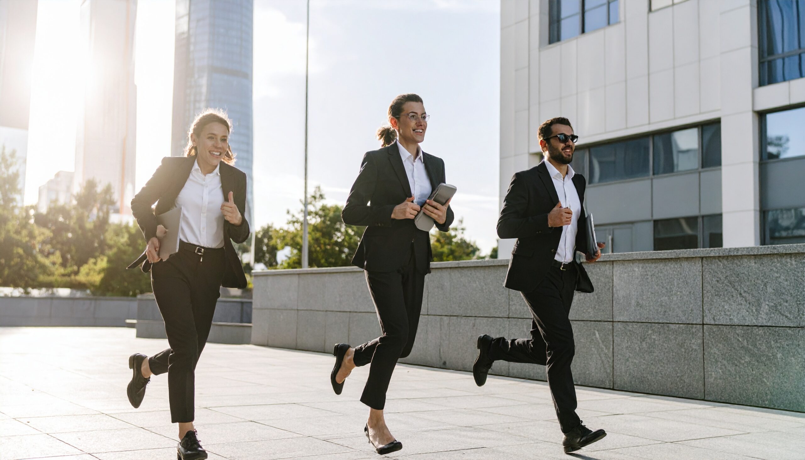 Firefly photo of office workers in business atire running a marathon with laptops and cellphones 683